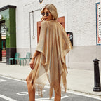 See-through tassel beach cover-up from 64b136-1e, featuring lightweight, sheer fabric with tassel details for stylish swimwear cover-up.