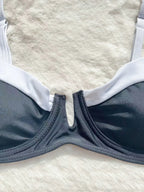 Black push-up swimwear set with 2-piece and 1-piece options, stylish and supportive women's swimwear by 64b136-1e.