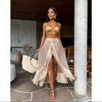Three-piece tassel skirt set from 64b136-1e, featuring a stylish skirt with decorative tassels and matching top.