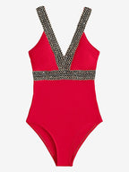 Colorful one-piece swimwear by 64b136-1e featuring detailed patterns and multiple styles, perfect for beach or pool outings.