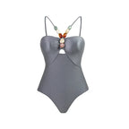 Retro one-piece swimwear with matching skirt in various prints from 64b136-1e brand, featuring colorful, vintage-inspired design.