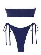 Colorful 64b136-1e ring bandeau bikini swimwear in multiple shades, featuring a sleek, strapless design perfect for beach or pool.