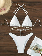 Triangle bikini set with seashell accents, stylish swimwear by 64b136-1e, featuring a trendy design and vibrant beach-ready look.