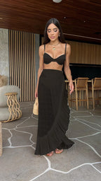 Three-piece set featuring a tassel skirt and matching top from the 64b136-1e brand, displayed on a neutral background.