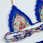 Dark blue lace boho cross bandage bikini set, stylish swimwear with intricate lace details and adjustable straps.
