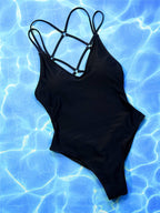 Colorful one-piece swimwear from 64b136-1e featuring a stylish design, available in multiple vibrant colors for women.