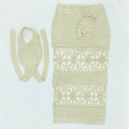 Crochet crossed top and skirt set by 64b136-1e, featuring a stylish matching ensemble with intricate crochet details on both pieces.