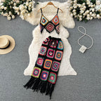 Two-piece knitted beach set from 64b136-1e, featuring a stylish top and matching bottoms ideal for summer beachwear.