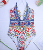 Colorful one-piece swimsuit by 64b136-1e swimwear collection, featuring a sleek design perfect for beach or pool.