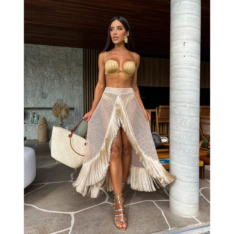 Three-piece set with tassel skirt, stylish fashion ensemble by 64b136-1e featuring coordinated top and skirt with tassel details.