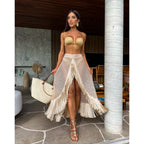 Three-piece set with tassel skirt, stylish fashion ensemble by 64b136-1e featuring coordinated top and skirt with tassel details.