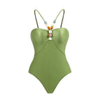 Retro one-piece swimwear with matching skirt by 64b136-1e, featuring multiple colorful prints and stylish design.
