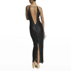 Backless tassel maxi dress by 64b136-1e featuring flowing fabric, tassel accents, and a stylish backless design.