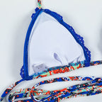 Dark blue lace boho cross bandage bikini set, stylish swimwear with intricate lace details and adjustable straps.