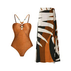 Retro one-piece swimwear with matching skirt in various prints by 64b136-1e featuring a stylish vintage-inspired design.