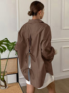 Back bow long sleeve blouse from 64b136-1e, featuring a stylish design with a bow detail at the back and long sleeves.