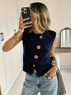 Golden button sleeveless top from 64b136-1e, stylish sleeveless blouse with gold buttons and a fitted design.