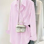 Striped pocket button shirt from 64b136-1e, casual tops featuring a front pocket and button closure in a stylish striped pattern.