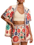 Tropical Breeze short sleeve top and shorts set by 64b136-1e, featuring a vibrant, tropical print in lightweight fabric.