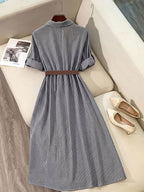 Striped belted shirt dress from 64b136-1e featuring a classic collar, long sleeves, and a waist belt for a stylish look.
