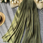 Elegant all-season wide-leg pants by 64b136-1e, shown in a natural pose, featuring a flowy fit and versatile style.