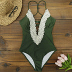 Elegant one-piece swimwear with lace details from 64b136-1e, available in five stylish styles and prints.