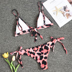 Triangle Boho Glamour bikini swimwear in vibrant colors, featuring a stylish triangle top and matching bottoms.