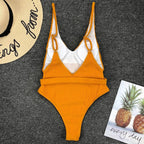 Colorful buckled one-piece swimsuit by 64b136-1e featuring a stylish design and adjustable buckle detail, perfect for swimwear occasions.