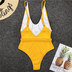 Colorful buckled one-piece swimsuit from 64b136-1e featuring a stylish design and adjustable straps, perfect for beachwear.
