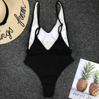 Colorful buckled one-piece swimsuit from 64b136-1e featuring adjustable straps and a stylish design for swimwear enthusiasts.