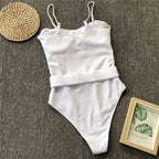 Colorful buckled one-piece swimsuit by 64b136-1e featuring a stylish design, available in multiple colors and styles.