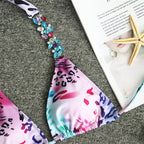 Triangle Boho Glamour bikini swimwear by 64b136-1e featuring a stylish triangle top and matching bottoms in boho-inspired design.