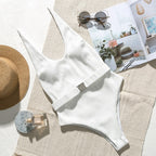 Colorful buckled one-piece swimsuit by 64b136-1e, featuring adjustable straps and a stylish design for swimwear enthusiasts.