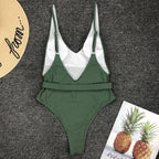 High cut one-piece swimsuit by 64b136-1e featuring a sleek design and vibrant color, perfect for stylish swimwear.