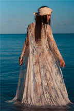 White lace cardigan tunic from 64b136-1e featuring delicate lace details, long sleeves, and a relaxed fit, ideal for layering.