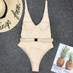 Colorful buckled one-piece swimsuit from 64b136-1e, featuring a stylish design with adjustable straps and a secure buckle detail.