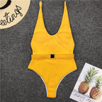 Colorful buckled one-piece swimsuit by 64b136-1e featuring adjustable straps and a sleek, stylish design for swimwear.