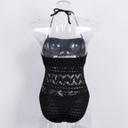 Black one-piece hollow swimsuit by 64b136-1e featuring stylish cutouts and a sleek design for swimwear fashion.