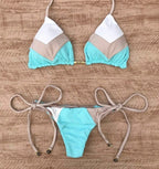 Brazilian tropical bikini swimsuit by 64b136-1e featuring vibrant tropical print, adjustable straps, and classic Brazilian cut.