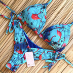 Brazilian Tropical Bikini Swimsuit by 64b136-1e featuring vibrant tropical print, adjustable straps, and classic bikini style.