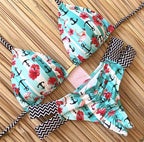 Brazilian Tropical Bikini Swimsuit from 64b136-1e, featuring colorful tropical print, adjustable straps, and a fitted swimwear design.