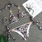 Triangle Boho Glamour bikini swimwear from 64b136-1e featuring a stylish triangle top and matching bottoms in vibrant boho design.
