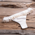 Crochet bikini swimwear with shell tassel accents, featuring a stylish and colorful design for beach or poolside wear.