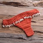 Crochet bikini with shell tassel detail, stylish swimwear from 64b136-1e, featuring a crochet top and matching bikini bottom with shell accents.