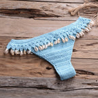 Crochet bikini with shell tassel swimwear in vibrant colors, featuring a stylish bikini top and bottom with shell embellishments.