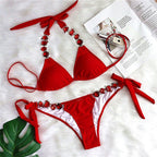 Triangle Boho Glamour Bikini swimwear by 64b136-1e featuring a stylish triangle top and matching bottom with boho-inspired details.