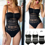 Black one-piece hollow swimsuit from 64b136-1e featuring cut-out design and sleek fit, ideal for stylish swimwear.