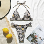 Snake print high cut bikini from 64b136-1e, featuring stylish swimwear with bold snake pattern and high leg design.