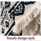 Boho style tassel beach rug with colorful woven design, perfect for outdoor lounging and beach trips.