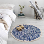 Boho style tassel beach rug with woven design and fringed edges, ideal for beach or outdoor use.